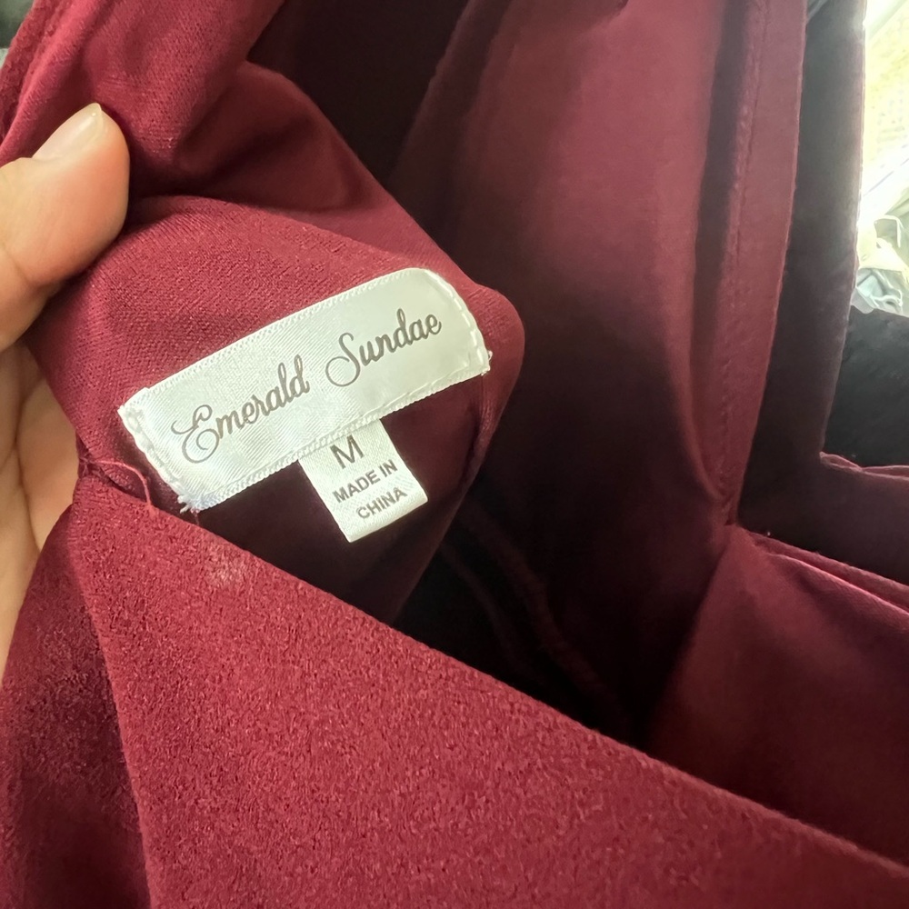 Burgundy V neck.